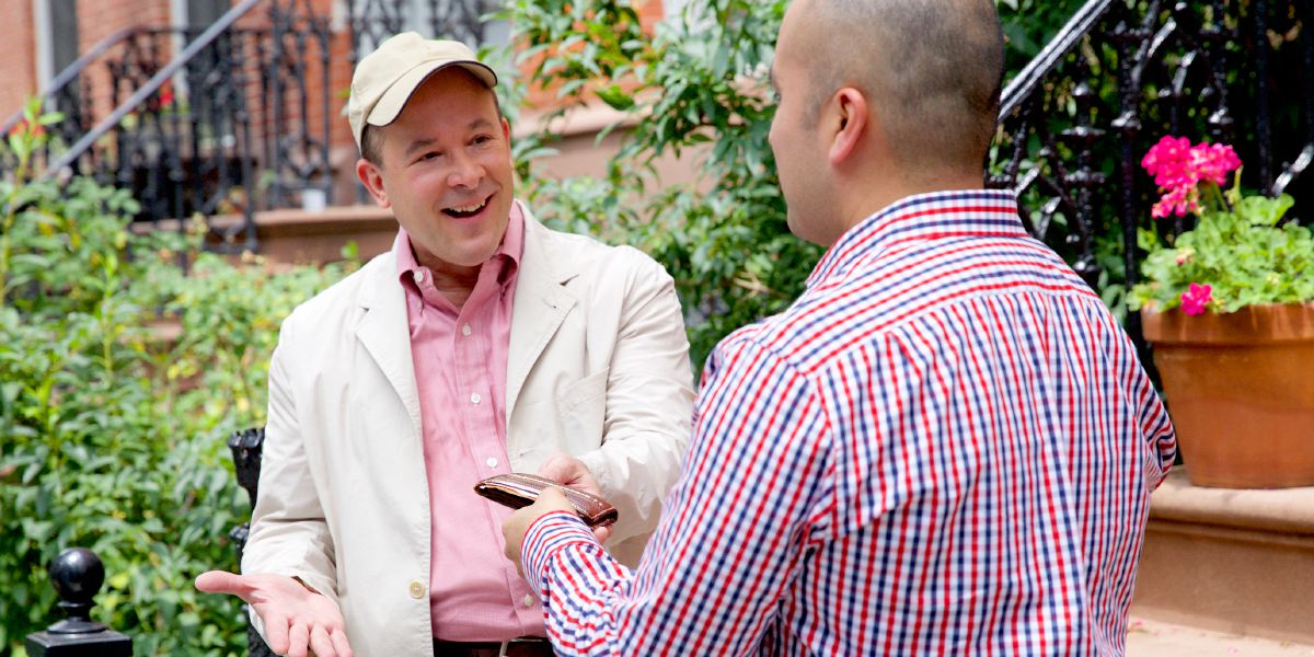A man returns a wallet to its owner