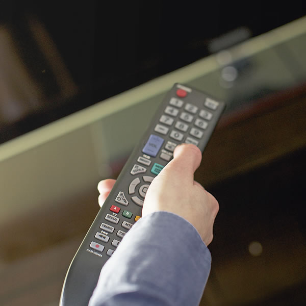 Someone using a remote control